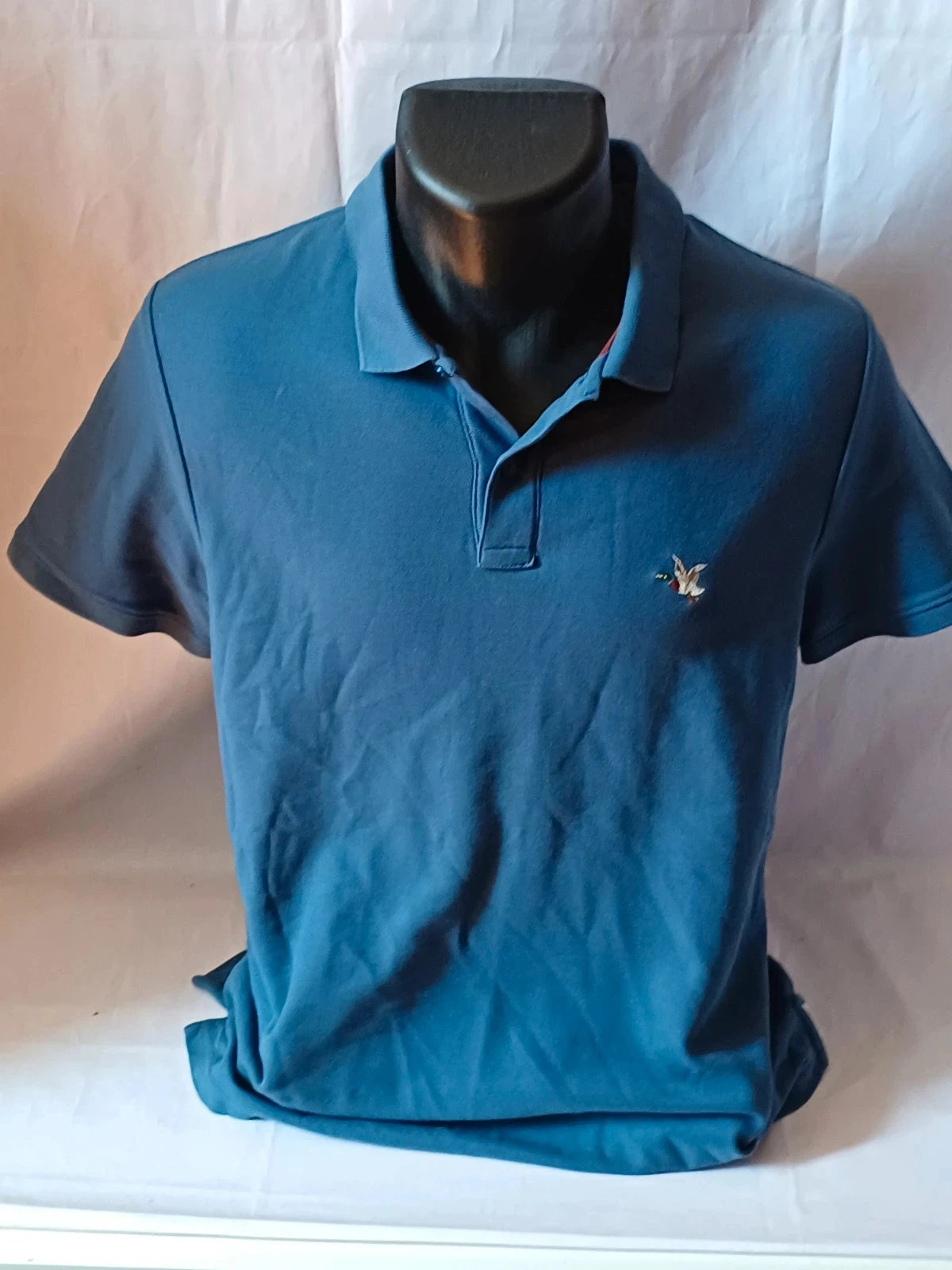 Polo bleu saison cheminons taille M